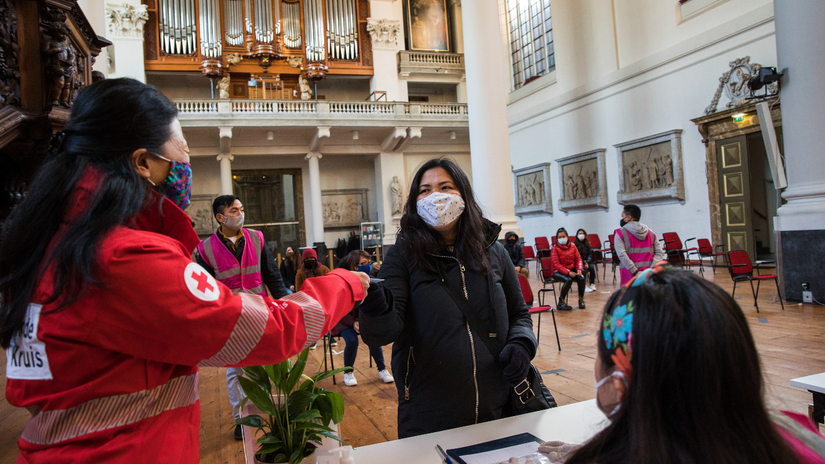 The Netherlands Red Cross hands out food vouchers to thousands of people who need food aid as a result of the COVID-19 pandemic and its impacts on people's socio-economic stability