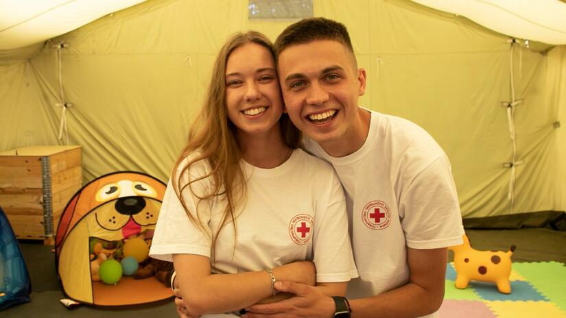 Daria and Ostap, youth volunteers with the Ukraine Red Cross providing psychosocial support services in the Red Cross health centre in Uzhhorod