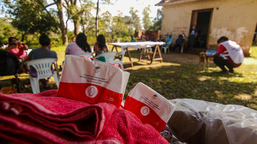 In the wake of floods that inundated entire communities in southern Brazil, the IFRC distributed hygiene kits that included sanitary napkins to help meet the health and hygiene needs of the community. 